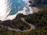 drone shot of coast road