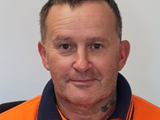 Portrait of an middle aged men in working clothes